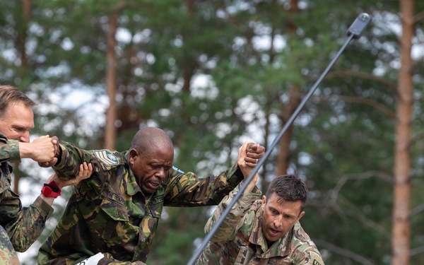 Maj. Sterling Broadhead assists international teammate