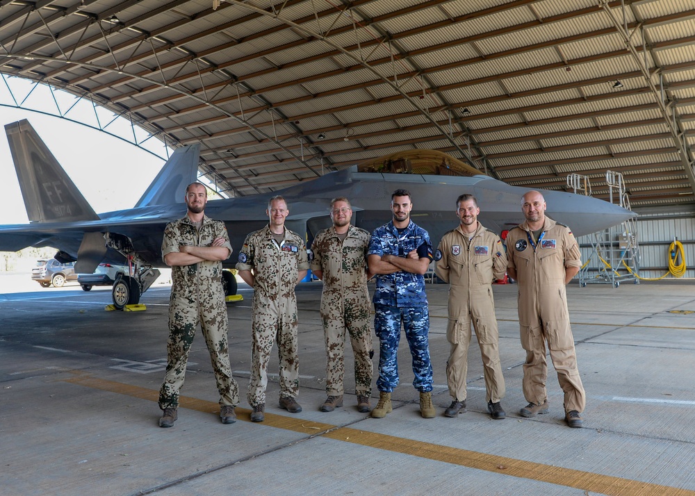 German military members tour USAF F-22A Raptor during Pitch Black 2024