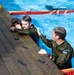 Col. Brent Dishman congratulates Staff Sgt. Zachary Mills