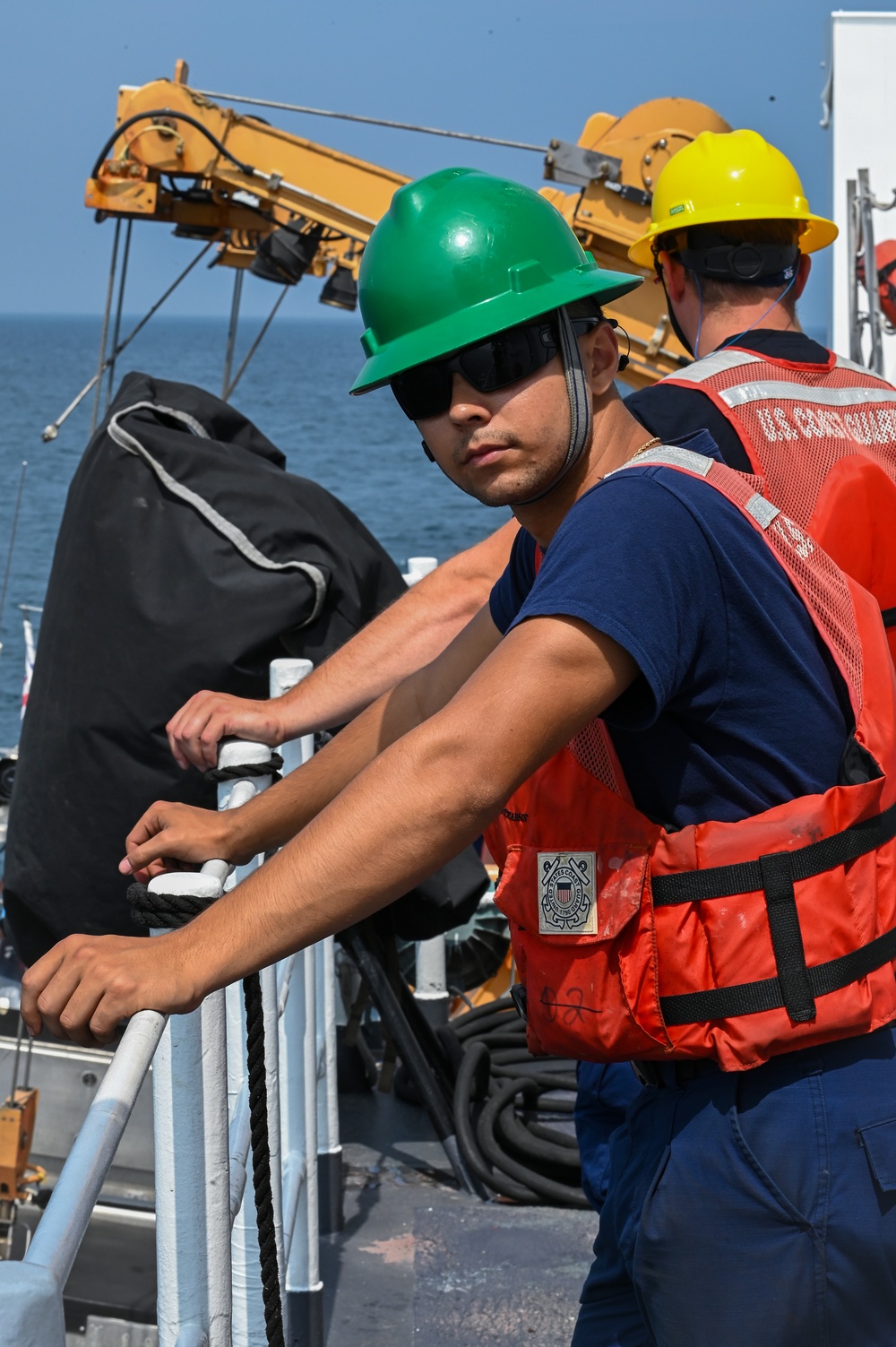 Coast Guard Cutter Northland crew members conduct drills and personnel transfers