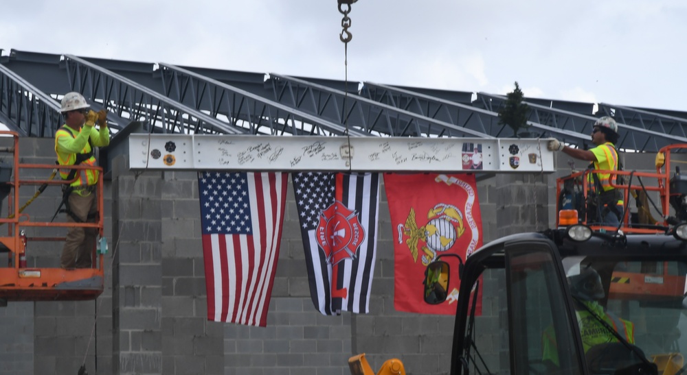 OICC Florence completes final topping out ceremony for fire station construction