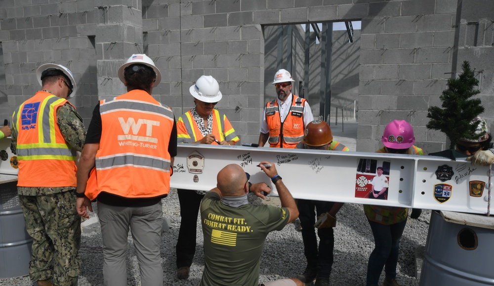 OICC Florence completes final topping out ceremony for fire station construction