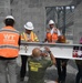 OICC Florence completes final topping out ceremony for fire station construction