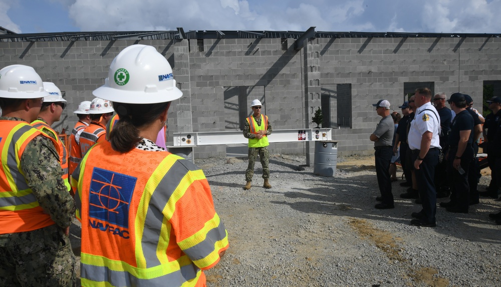 OICC Florence completes final topping out ceremony for fire station construction