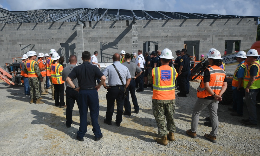 OICC Florence completes final topping out ceremony for fire station construction