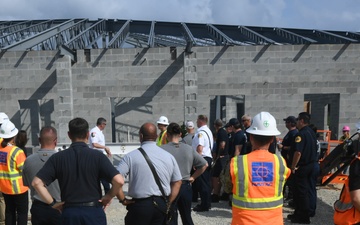 OICC Florence completes final topping out ceremony for fire station construction