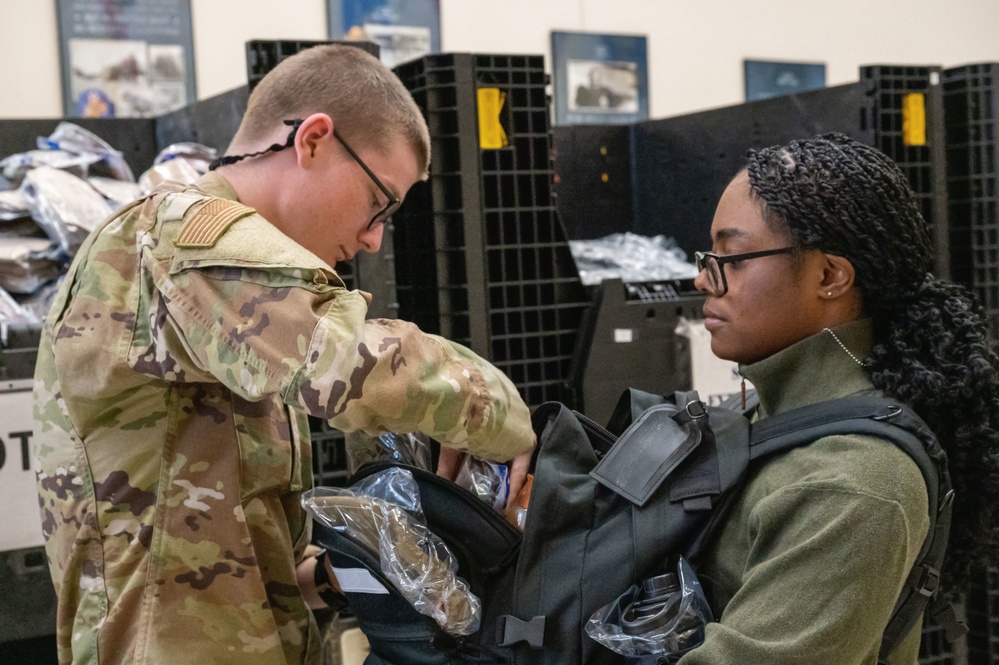 U.S. Air Force Basic Military Training Trainee Recieves Suppplies