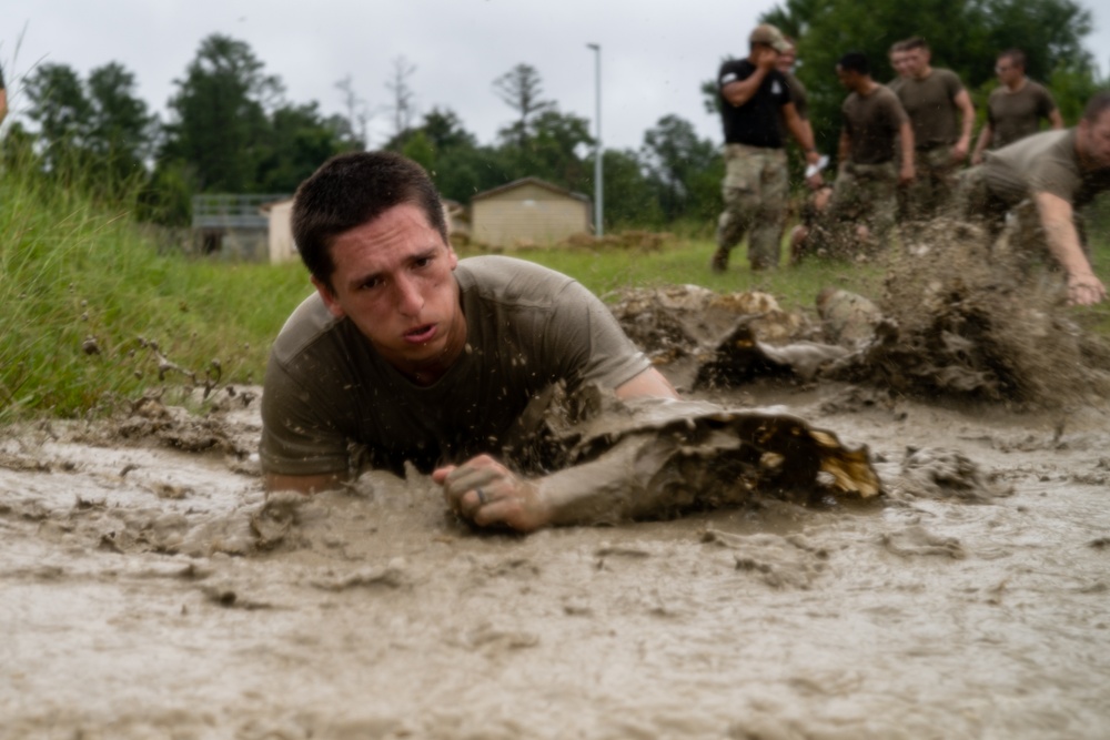 Chaplain candidates close out field training with run and obstacle course