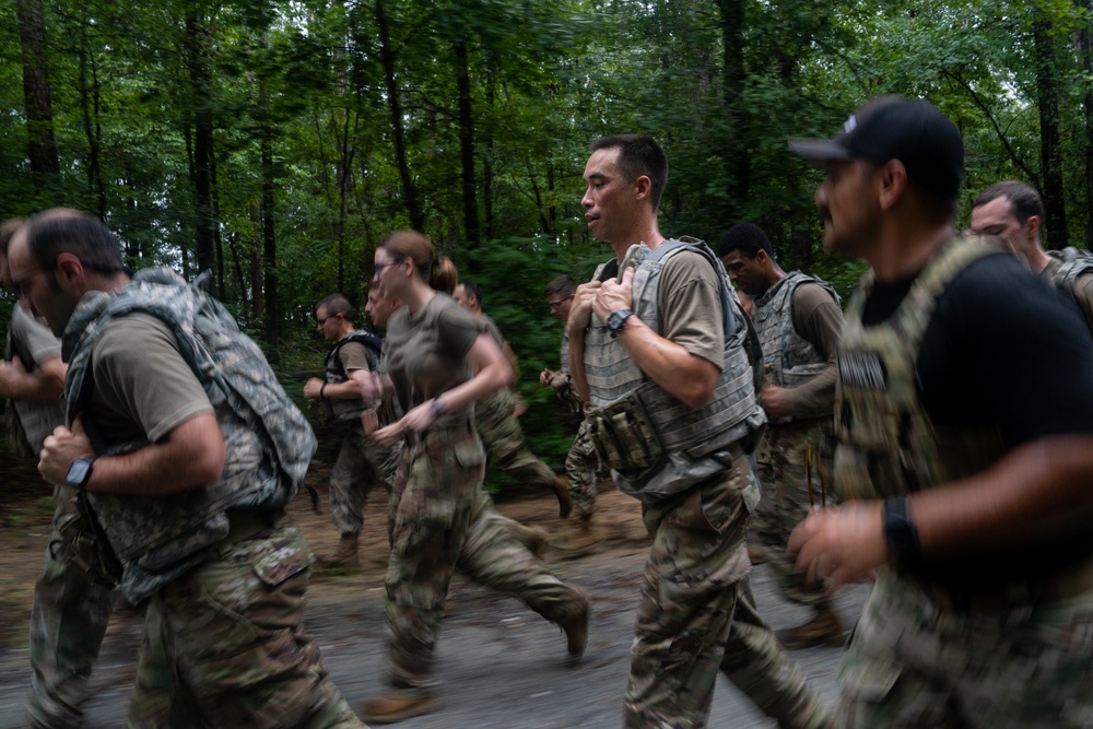 Chaplain candidates close out field training with run and obstacle course