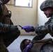 Marines and Sailors demonstrate care under fire