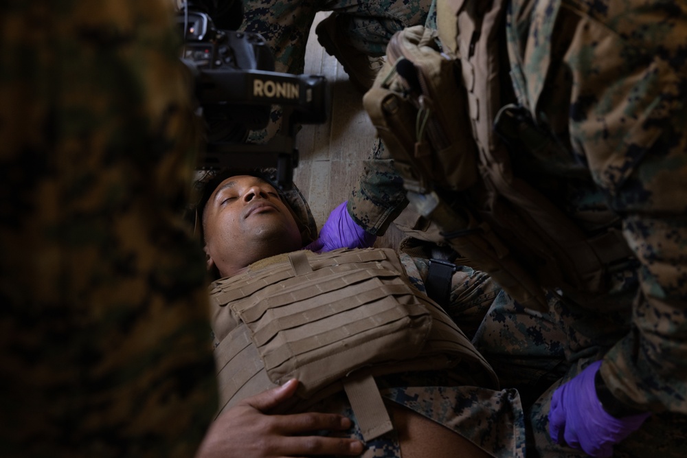 Marines and Sailors demonstrate care under fire