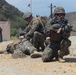 Marines and Sailors demonstrate care under fire