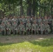 National Guardsmen from varying states pose for a group photo after the Marksmanship Advisory Council Region Five Match