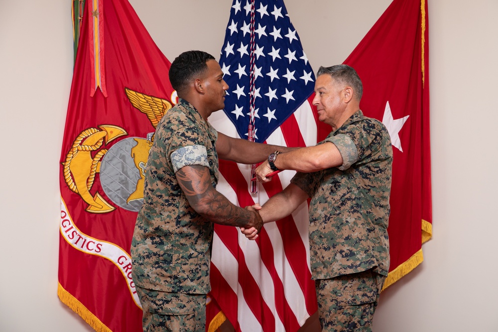 Brigadier General Chalkley Congratulates the NCO of the Quarter