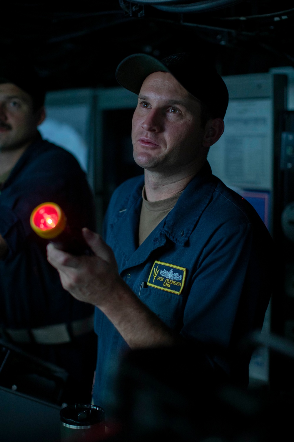 USS Tripoli Sailors Stand watch on the bridge