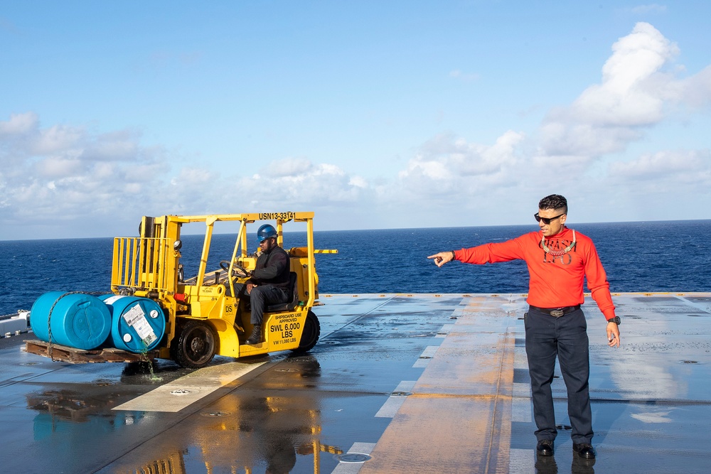 Sailors Scrub the flight deck