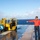 Sailors Scrub the flight deck Sailors Scrub the flight deck