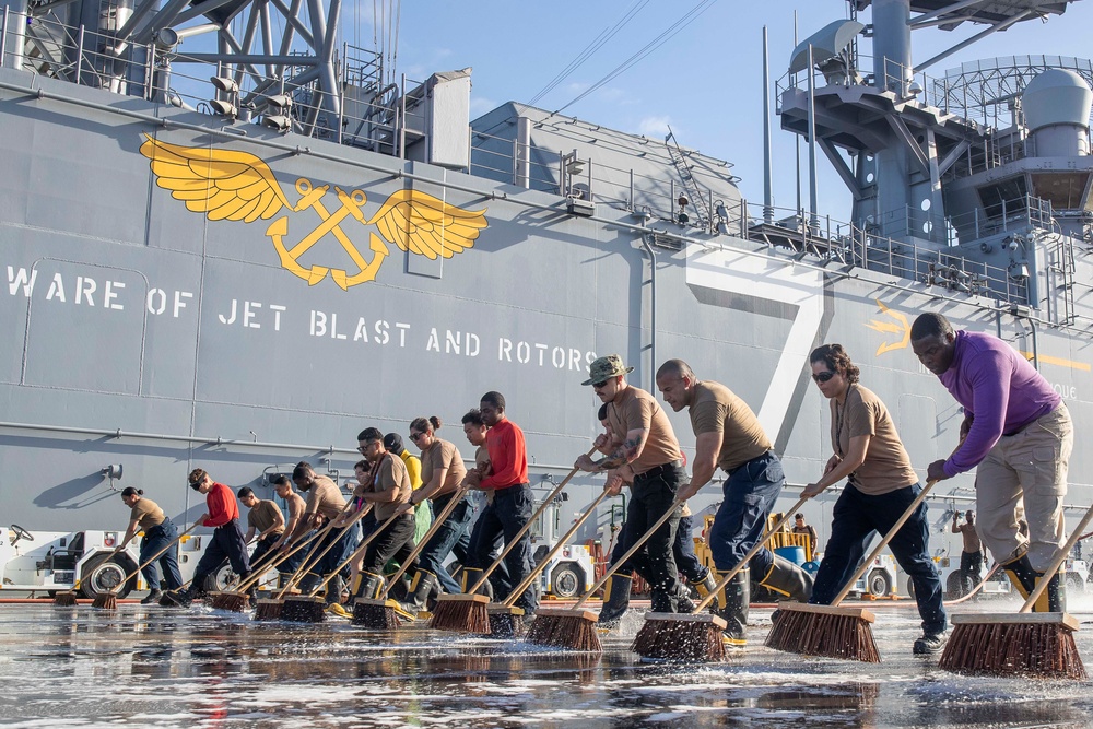 Sailors Scrub the flight deck