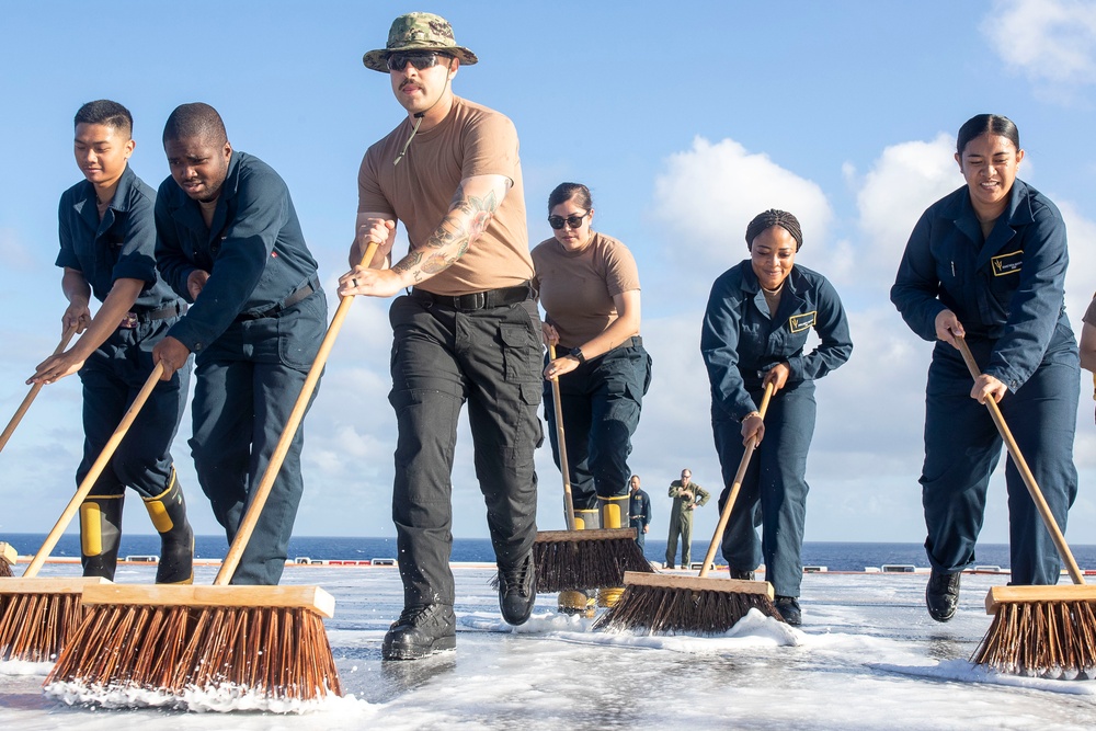 Sailors Scrub the flight deck