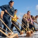 Sailors Scrub the flight deck