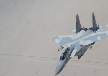U.S. KC-135s refuel Qatari F-15s during exercise Sky Shield 9