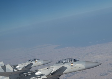 U.S. KC-135s refuel Qatari F-15s during exercise Sky Shield 9