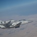 U.S. KC-135s refuel Qatari F-15s during exercise Sky Shield 9