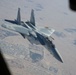 U.S. KC-135s refuel Qatari F-15s during exercise Sky Shield 9