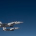 U.S. KC-135s refuel Qatari F-15s during exercise Sky Shield 9