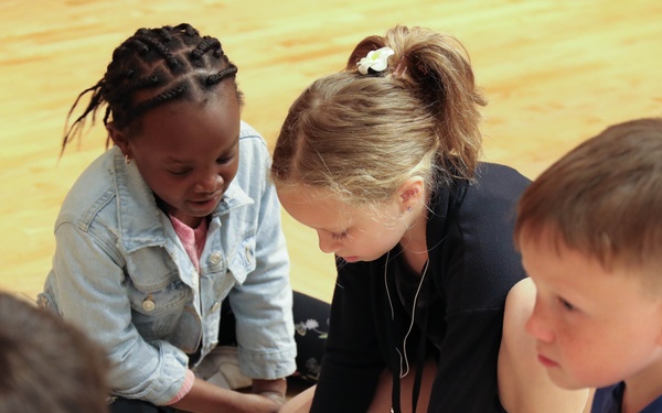 Children problem solve during WRAIR's egg drop competition