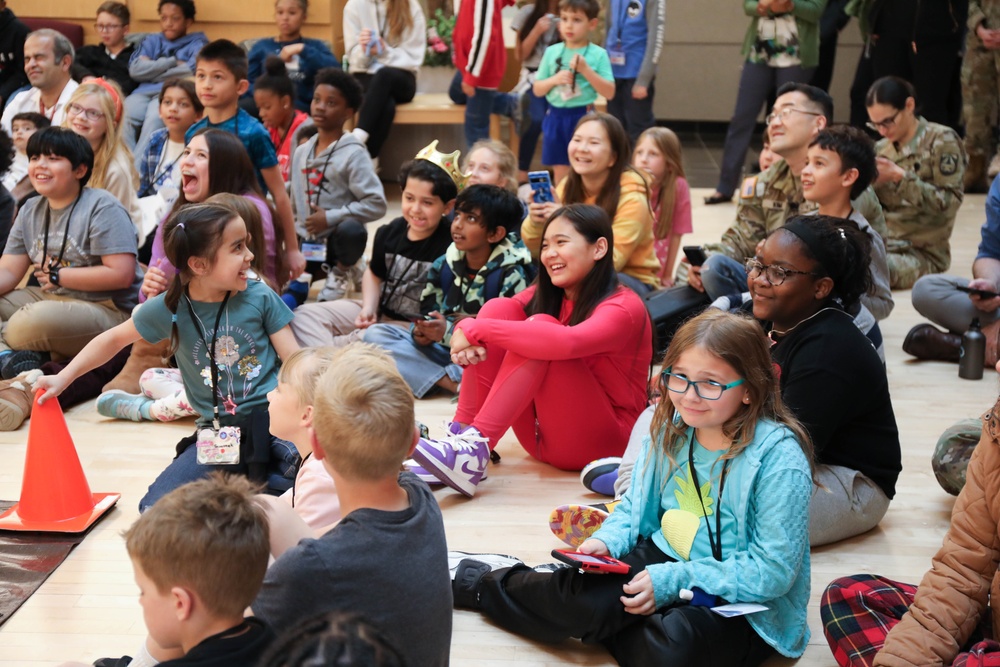 Children problem solve during WRAIR’s egg drop competition