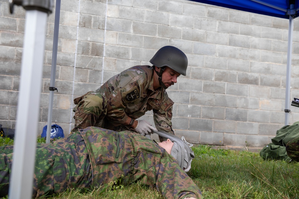Lt. Col. James Fink tends to a casualty