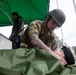 Sgt. Trenton Tuberosa covers a casualty