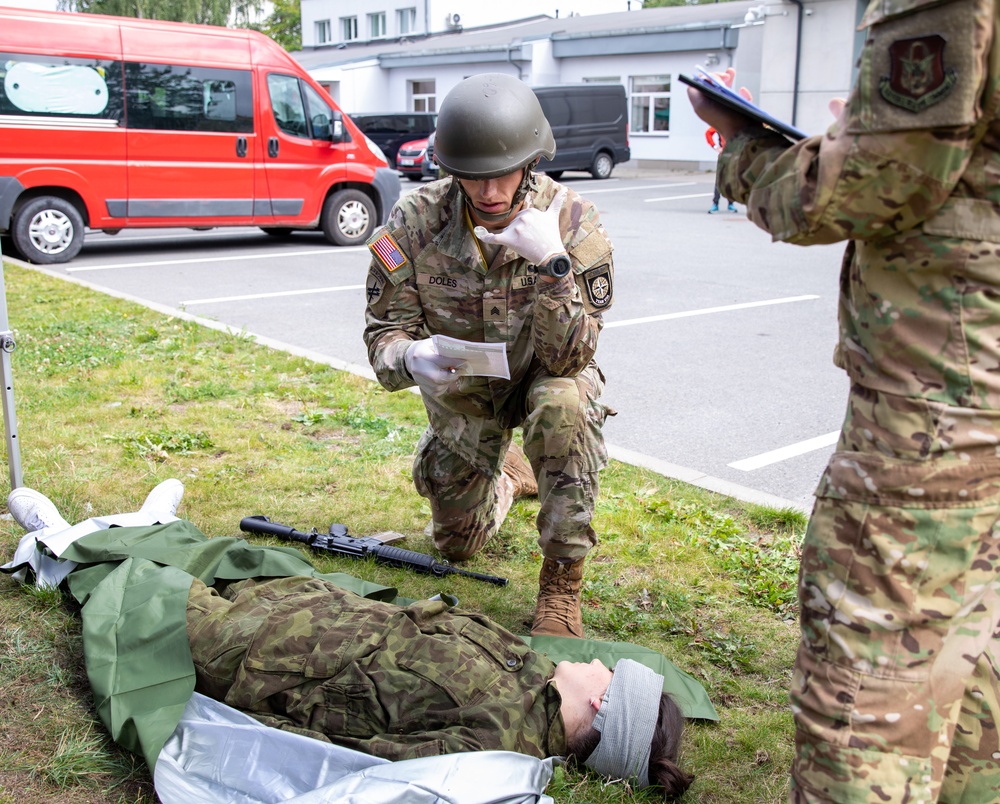 Sgt. Thomas Doles calls in a simulated 9 line medical evacuation