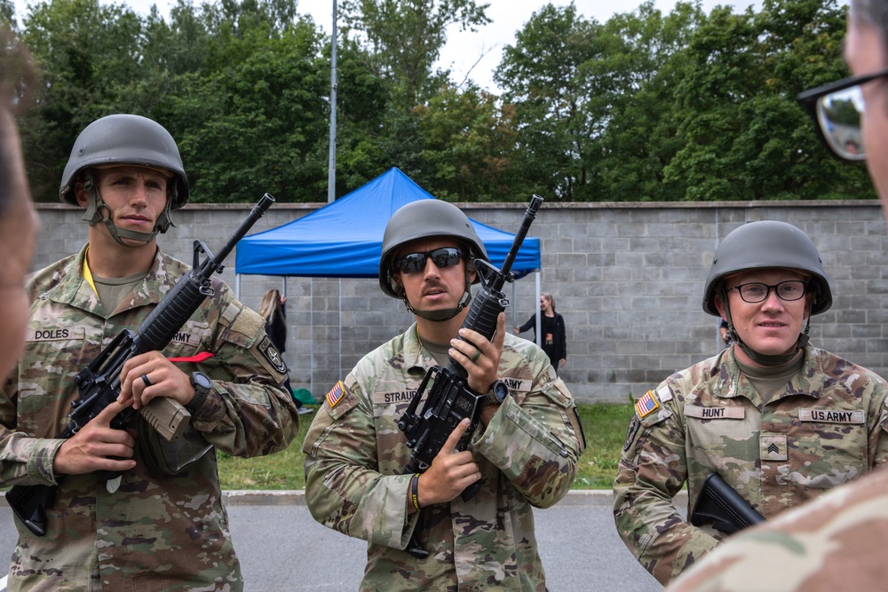 Service members prepare to compete in a Tactical Combat Casualty Care Competition