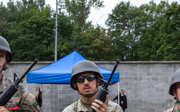 Service members prepare to compete in a Tactical Combat Casualty Care Competition