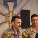 Lt. Col. Thomas Sebastiani receives a gold medal