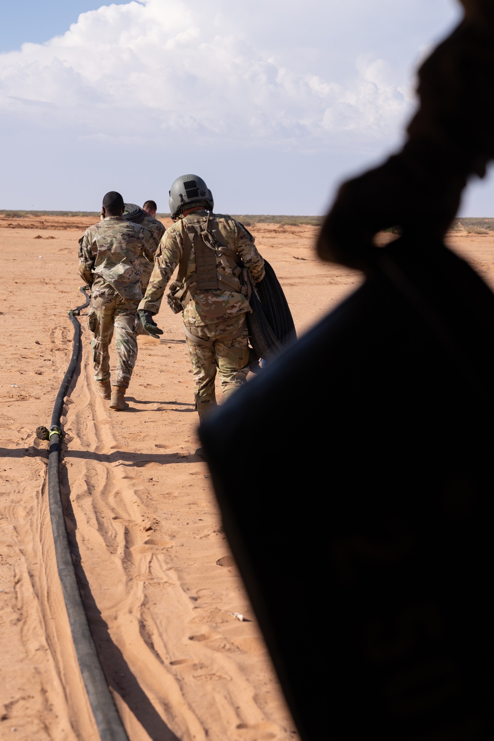 1st Armored Division Aviation and Field Artillery Conduct Refueling Operations
