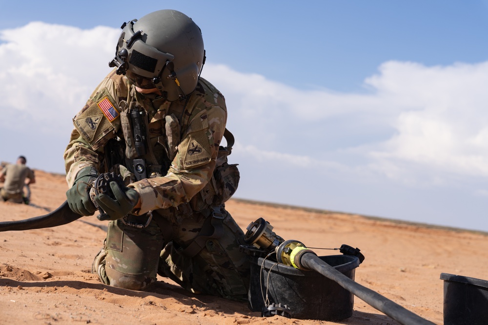 1st Armored Division Aviation and Field Artillery Conduct Refueling Operations