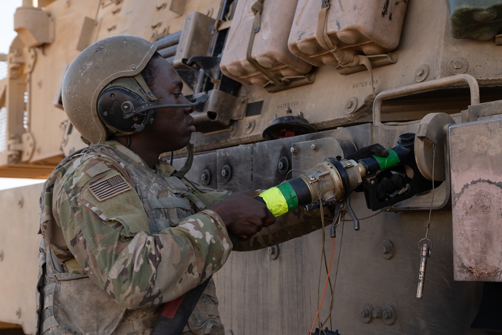 1st Armored Division Aviation and Field Artillery Conduct Refueling Operations