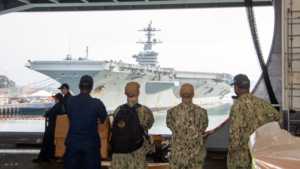 USS Ronald Reagan (CVN 76) Sailors prepare to cross deck to USS George Washington (CVN 73)