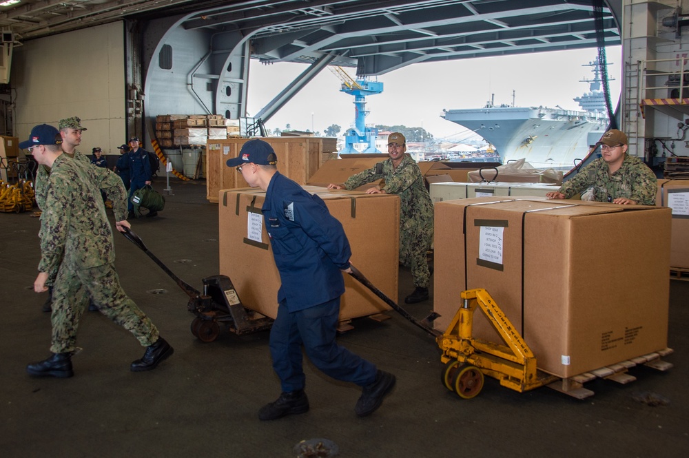 USS Ronald Reagan (CVN 76) Sailors prepare to cross deck to USS George Washington (CVN 73)