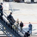 USS Ronald Reagan (CVN 76) Sailors prepare to cross deck to USS George Washington (CVN 73)