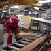 USS Ronald Reagan (CVN 76) Sailors fabricate a machine component