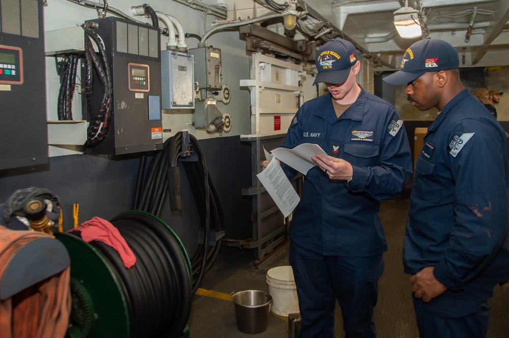 USS Ronald Reagan (CVN 76) Sailors conduct maintenance