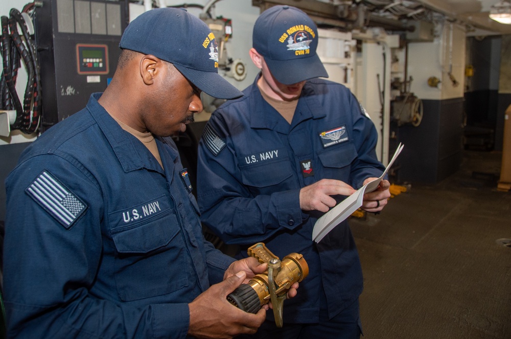 USS Ronald Reagan (CVN 76) Sailors conduct maintenance