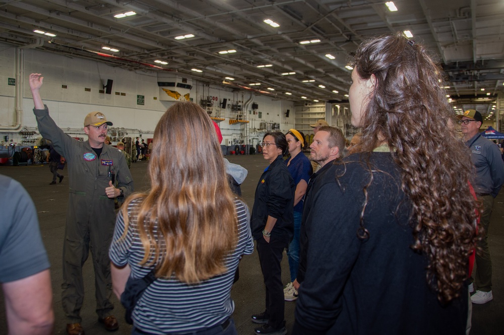 USS Ronald Reagan (CVN 76) hosts members of the USS Midway museum