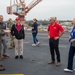 USS Ronald Reagan (CVN 76) hosts members of the USS Midway museum