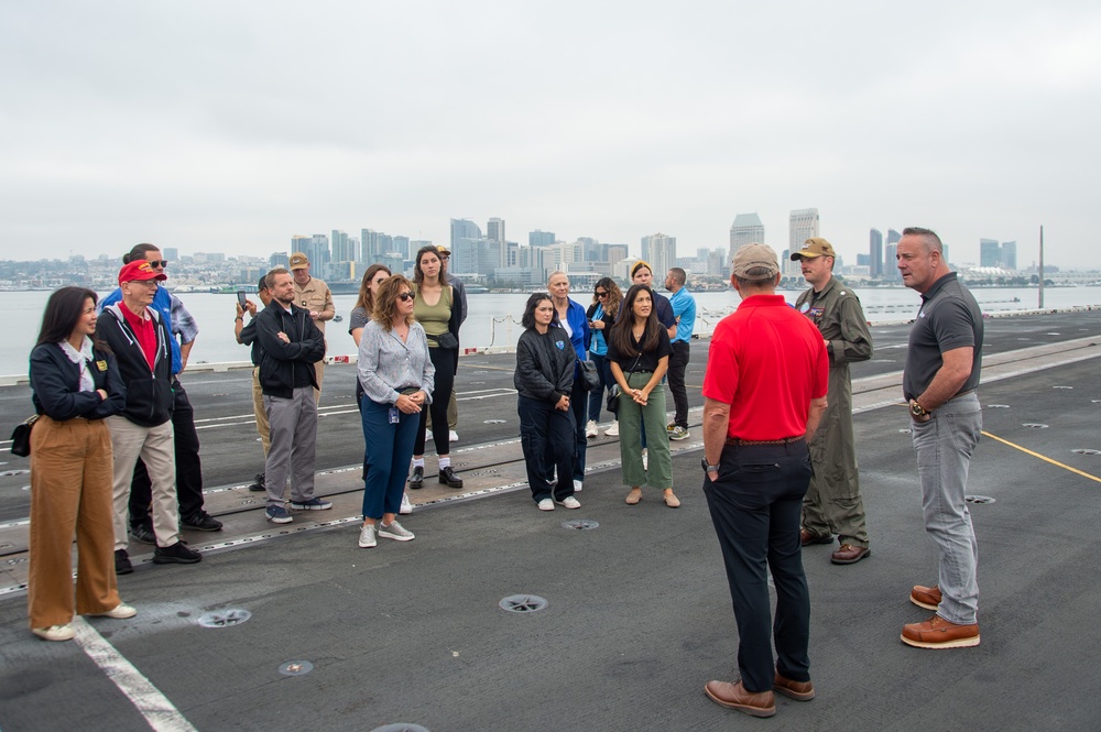 USS Ronald Reagan (CVN 76) hosts members of the USS Midway museum