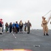 USS Ronald Reagan (CVN 76) hosts members of the USS Midway museum